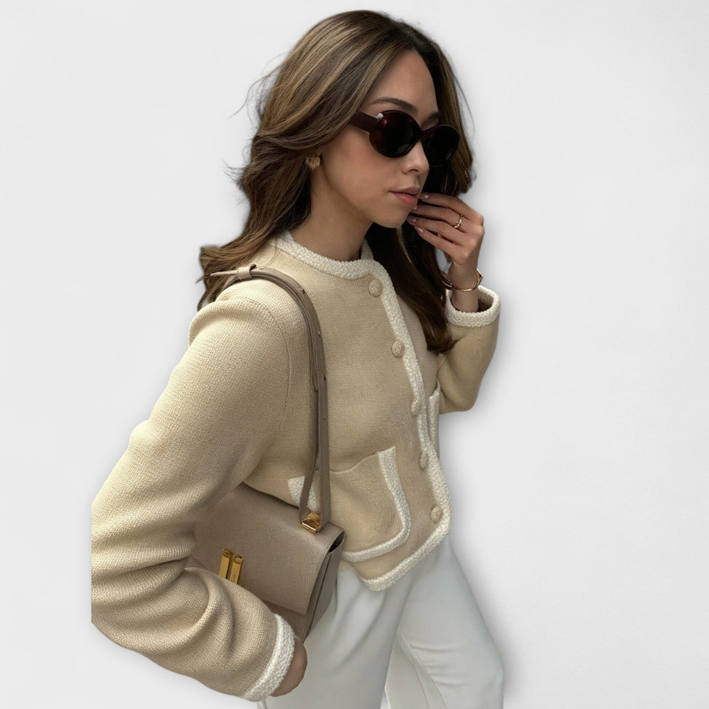 Klasični pulover z okrasnimi žepi