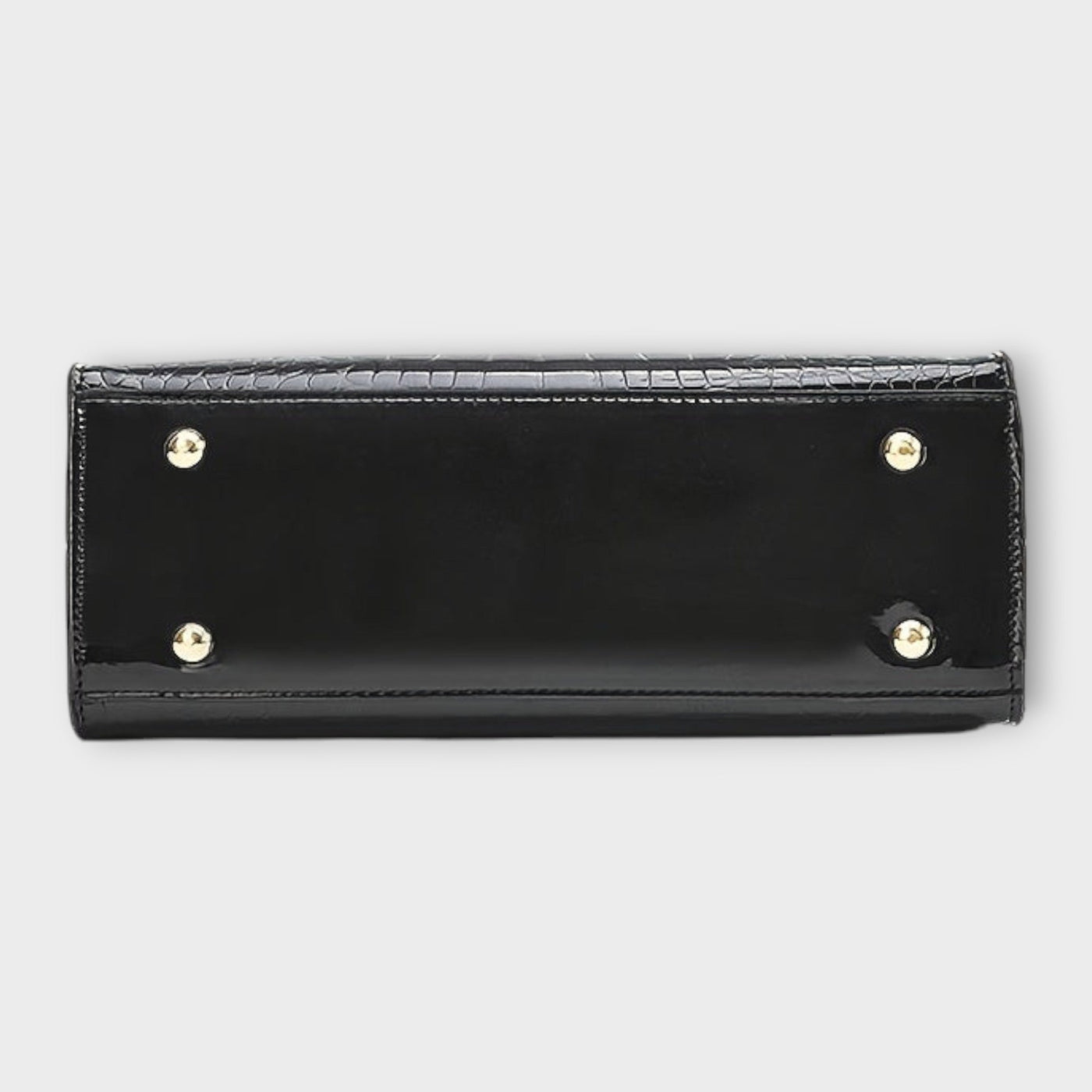 Cécile. - Sijajna torbica z vzorom krokodila