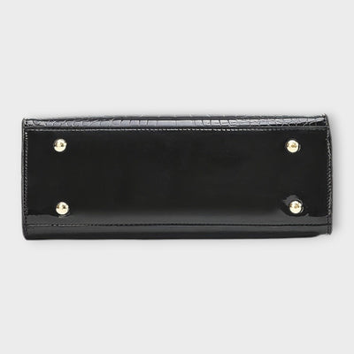 Cécile. - Sijajna torbica z vzorom krokodila